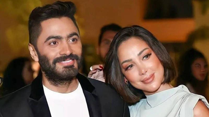 تفاعل واسع حول تامر حسني وبسمة بوسيل بعد صور رأس السنة